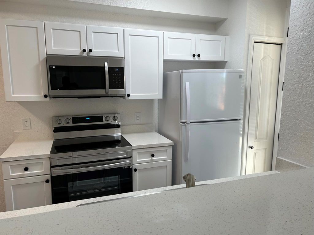 Photo of 11035 Legacy Boulevard #204, Palm Beach Gardens, FL 33410 (MLS # R11074954)