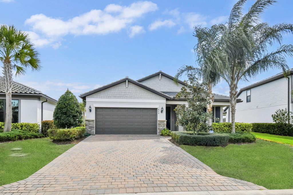 Photo of 479 SE Vallarta Drive, Port Saint Lucie, FL 34984 (MLS # R11165793)