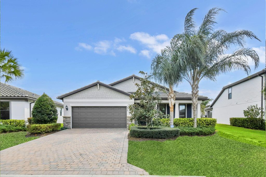 Photo of 479 SE Vallarta Drive, Port Saint Lucie, FL 34984 (MLS # R11165793)