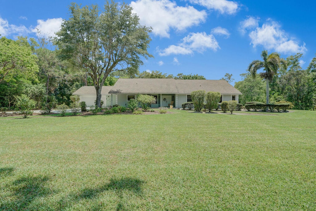 Photo of 13064 155th Place N, Jupiter, FL 33478 (MLS # R10992320)