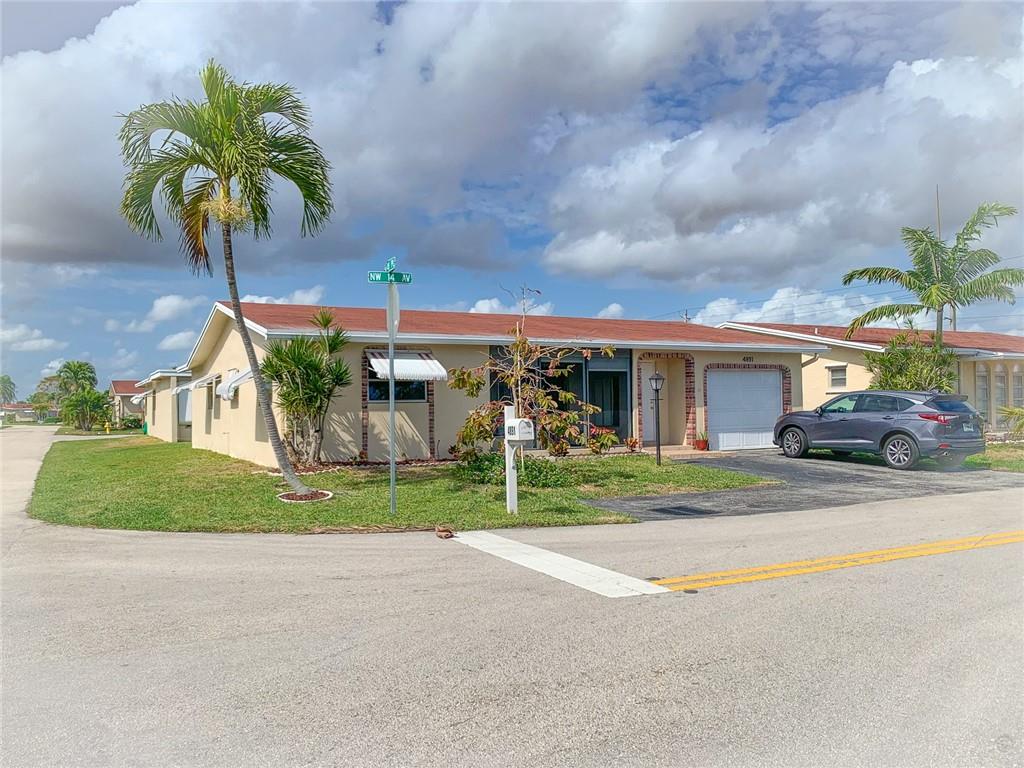 Photo of 4891 NW 14th Ave, Deerfield Beach, FL 33064 (MLS # F10271201)