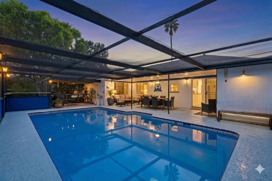 Experience the ultimate freedom of homeownership with county-only taxes and NO HOA. This "coastal cottage" sits on an oversized corner lot and is CBS. Featuring a 2023 roof and a screened-in pool with a new pump (2025). Rare for the area, the property offers additional dedicated parking for a boat or RV in the rear. Inside, enjoy an open floor plan with no carpet, a white kitchen with a gas stove, and a smart layout where the guest room features en-suite access—acting as a second primary suite. Peace of mind is built-in with a whole-house Generac generator and a 2021 water heater. The garage includes a workshop/storage room and extra fridge. Located in a sidewalk-lined community on city water/sewer, but with a private well for the sprinklers. High efficiency meets total utility.