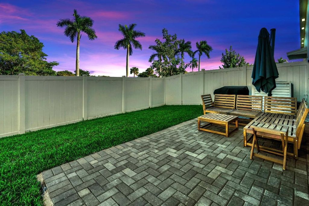 Photo of 4246 Lagoon Shore Drive, Lake Worth, FL 33467 (MLS # R11157726)