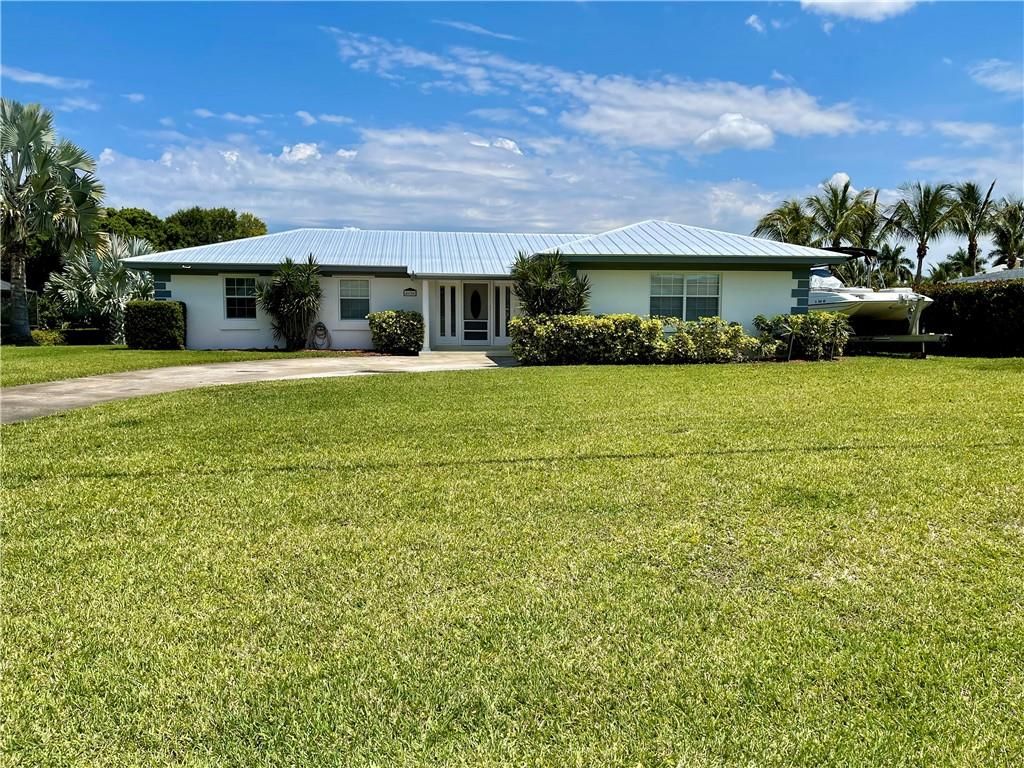 Photo of 416 S Naranja Ave, Port Saint Lucie, FL 34983 (MLS # F10331009)