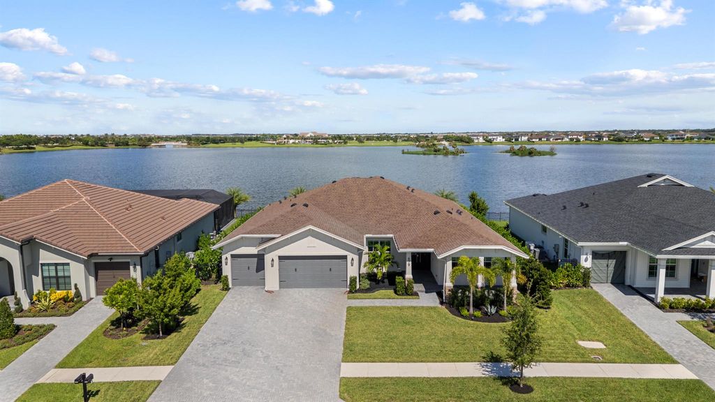 Photo of 679 Hookline Circle, Loxahatchee, FL 33470 (MLS # R11132157)