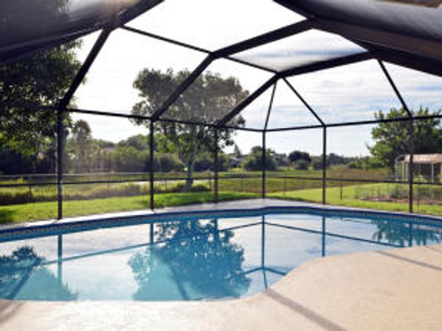 Don't wait on this beautifully updated CBS Pool home in desirable NW section on a cul-de-sac! Home has been freshly painted in and out and features a huge kitchen with Maple Cabinets, Granite Counters, and built in eating area with Granite tops. The large split floor plan features tile throughout, a fireplace, pocket sliding glass doors to covered patio, Plantation Shutters, a large pantry, and a pass through window from the kitchen to a wet bar area on the covered patio! The large screened pool backs to a preserve area for added privacy and the yard is fenced with a storage shed! This great home even has hurricane protection, an insulated garage door with hurricane bracing, and even the garage floor has been coated! Hot tub & appliances were left by previous owner & not warranted.