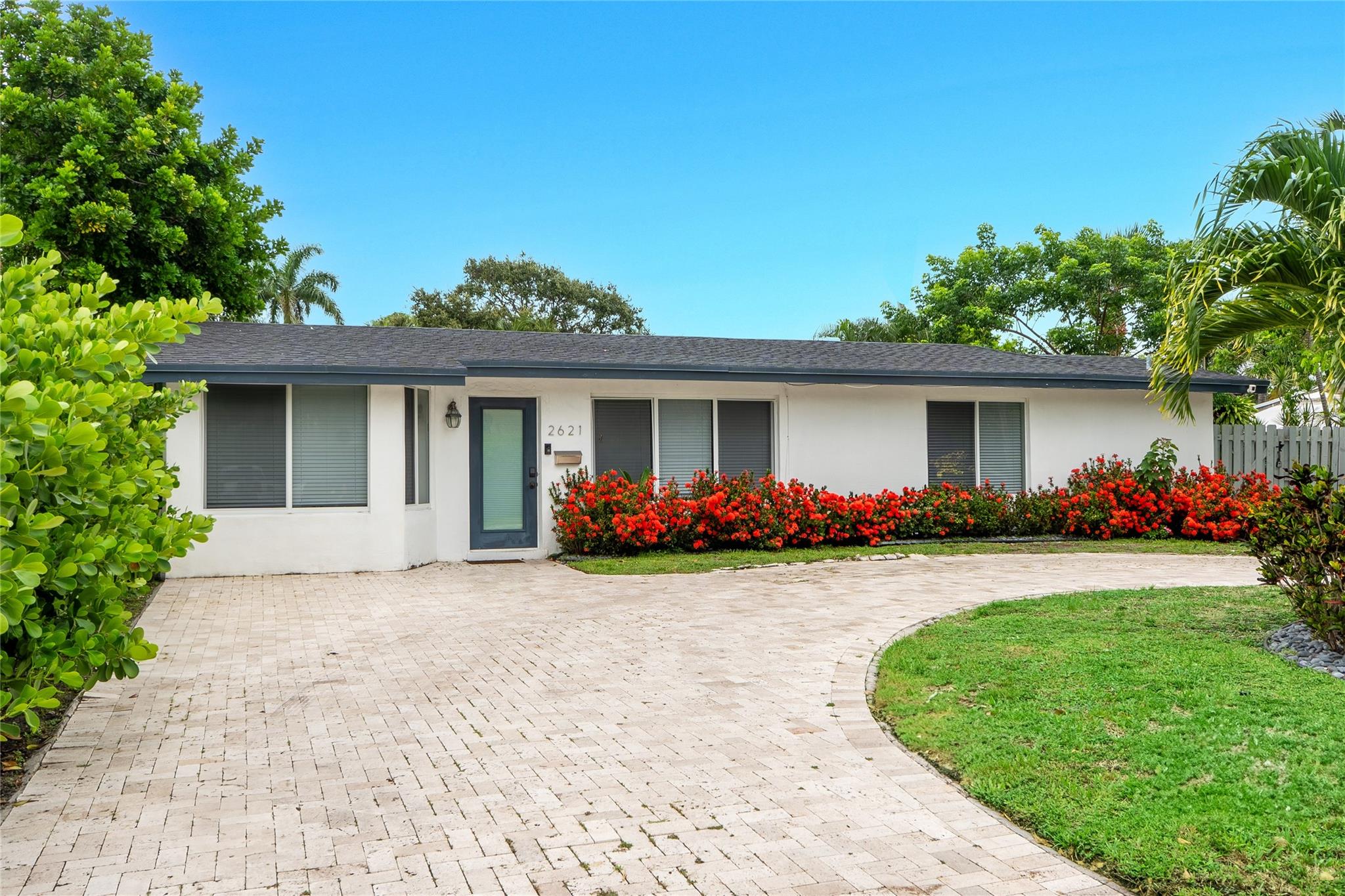 With no HOA, a turnkey living experience, and thoughtfully upgraded features just steps from shopping and the sand, this home offers exceptional value and lifestyle appeal. Move-in ready and located just 1 mile from the beach and 2 blocks from shopping in sought-after Connor Estates, this updated residence features a practical split floor plan ideal for privacy and comfort. Recent upgrades include a new roof, modernized bathrooms, a chlorinated pool, and a stylish kitchen with a bar that seats five, perfect for casual dining and entertaining. The backyard boasts a nearly 20 foot screened-in area, ideal for relaxing or building out a full outdoor kitchen. Whether you’re into fishing, diving, or yachting, this location puts you just minutes from South Florida’s top coastal experiences.