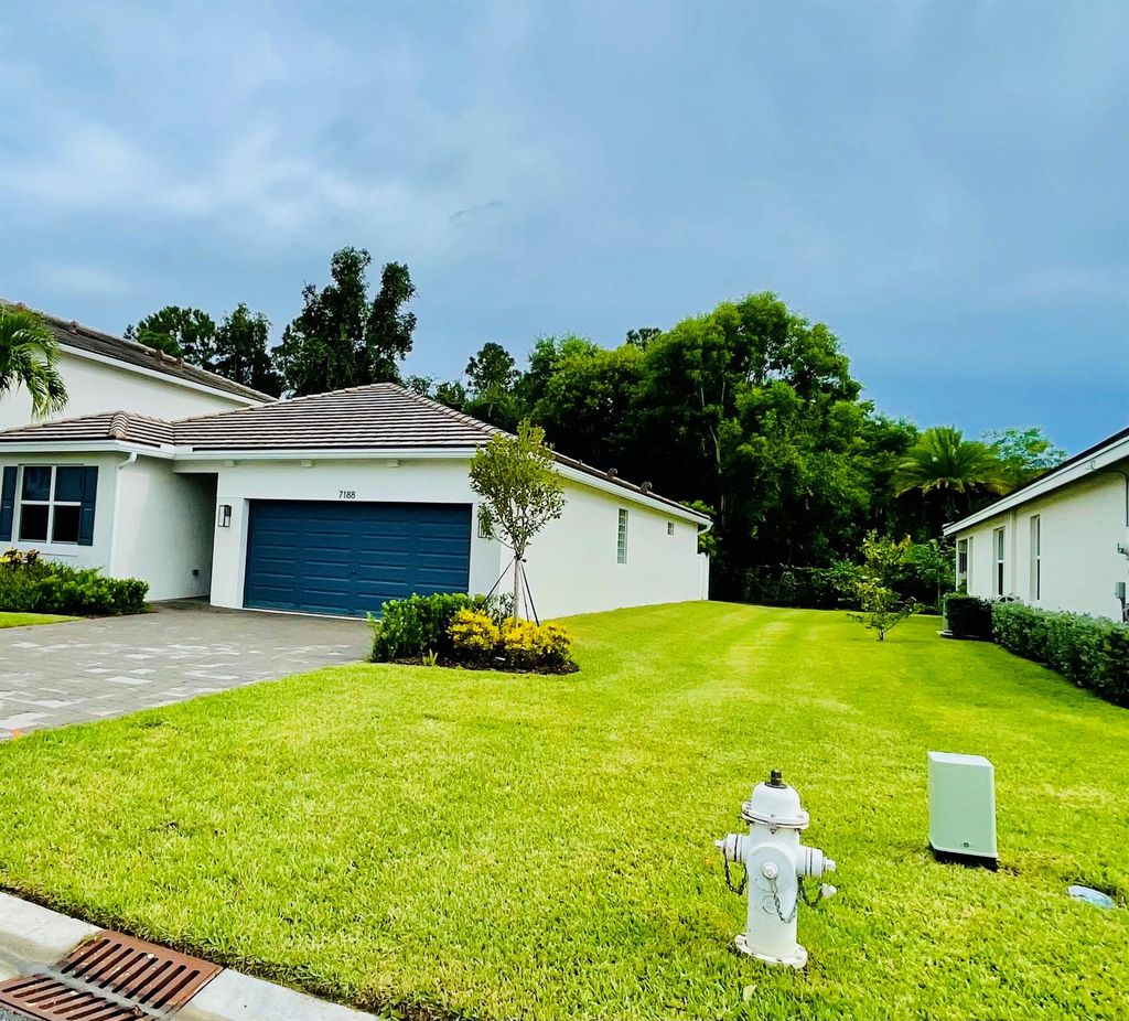 Photo of 7188 Trotwood Lane, Jupiter, FL 33458 (MLS # R11090800)