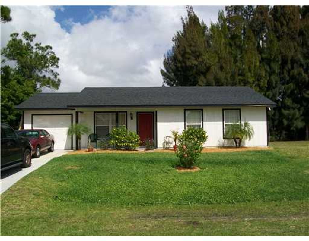 Photo of 1050 SW Fenway Road, Port Saint Lucie, FL 34953 (MLS # R11141546)