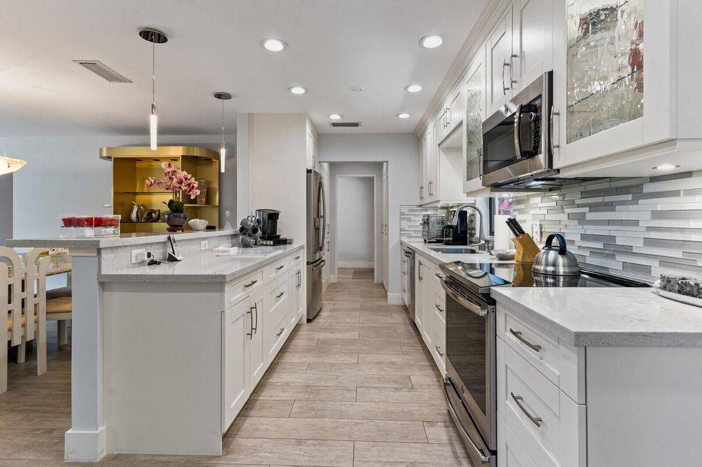 Photo of 21188 Juego Circle #17-A, Boca Raton, FL 33433 (MLS # R11091386)