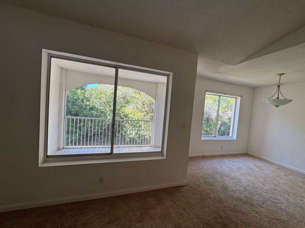 Photo of 815 W Boynton Beach Boulevard #14-203, Boynton Beach, FL 33426 (MLS # R11073268)