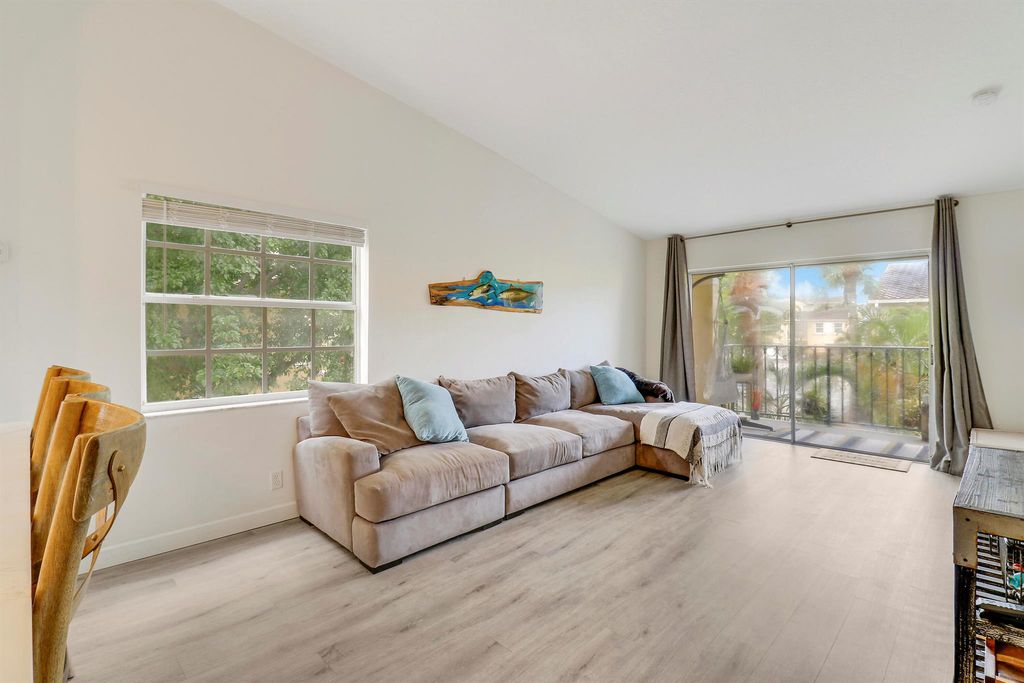 Photo of 1035 Lake Shore Drive #204, Lake Park, FL 33403 (MLS # R11000335)