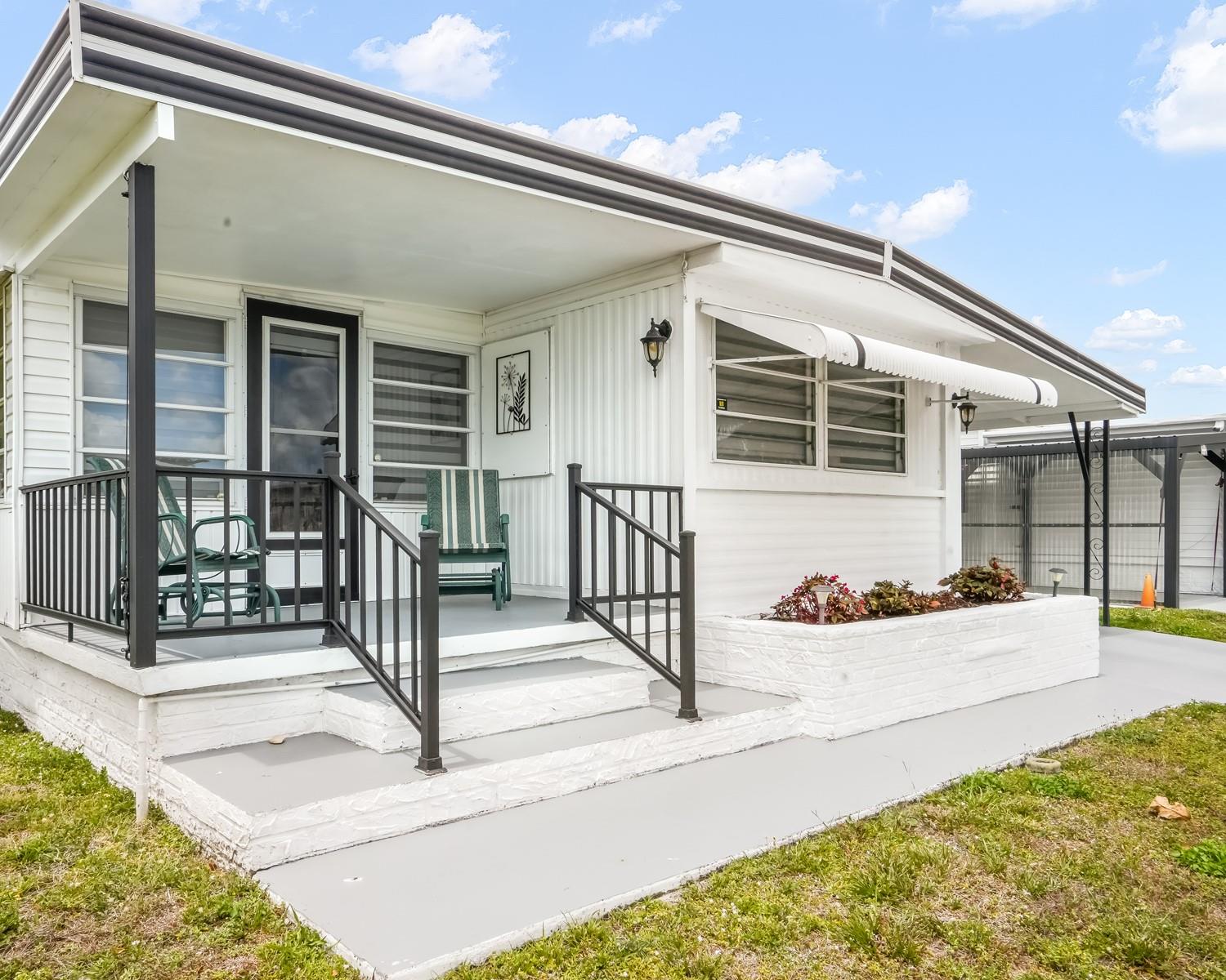 Discover this lovely, well-maintained 2 bedroom 2 bathroom mobile home in the 55+ Park City Estates, where you OWN the land! Fully furnished and updated, it’s ready for you to move in—TURN KEY! The home features a large
carport with storage shed and a washer/dryer, aluminum roof, updated kitchens, beautifully renovated bathrooms, ceramic tile and wood flooring, and newer AC and Water Heater. Conveniently located near the beach, highways, Broward Mall, Sawgrass Mills, colleges, hospitals, and public transport. Don’t miss this chance to own your own land and make this charming home your very own! The house can be sold all furnished.