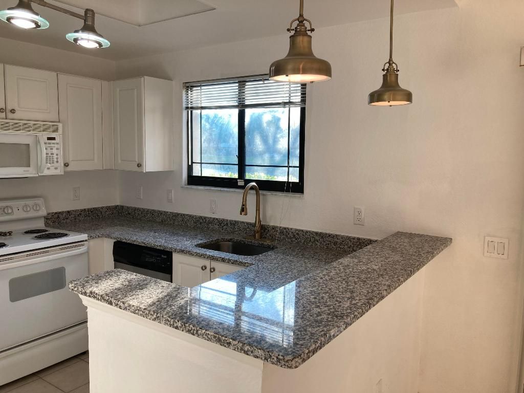 Photo of 2807 Veronia Drive #106, Palm Beach Gardens, FL 33410 (MLS # R10991309)