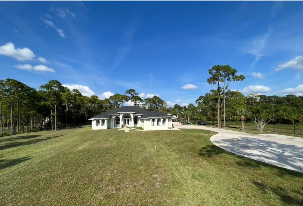 Photo of 14785 Orange Boulevard, The Acreage, FL 33470 (MLS # R11069423)