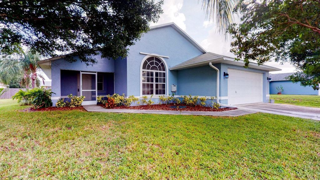 Photo of 359 SW Duxbury Avenue, Port Saint Lucie, FL 34983 (MLS # R11122875)