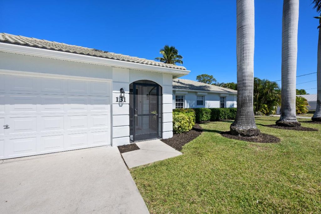 Photo of 131 NE Naranja Avenue, Port Saint Lucie, FL 34983 (MLS # R11158859)