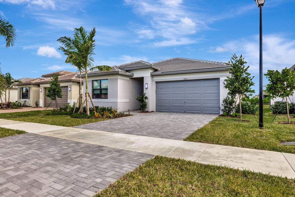 Photo of 12611 SW Manatee Marsh Terrace, Port Saint Lucie, FL 34987 (MLS # B26043633)