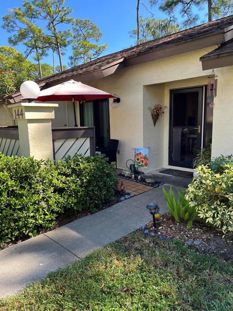 Photo of 144 Karanda Ct, Royal Palm Beach, FL 33411 (MLS # R11137107)