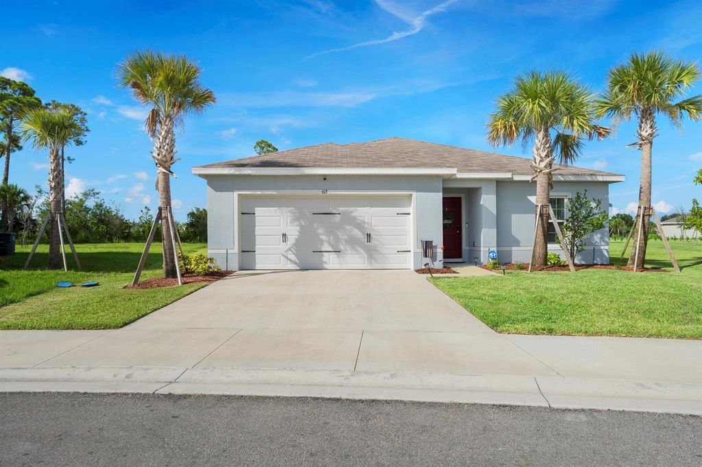 Photo of 613 Lychee Lane, Fort Pierce, FL 34981 (MLS # R11009568)