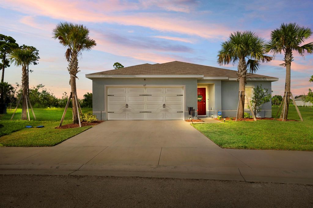 Photo of 613 Lychee Lane, Fort Pierce, FL 34981 (MLS # R11009568)