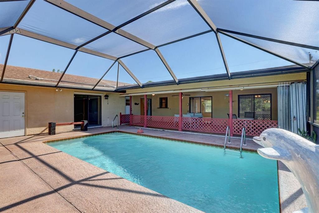 Photo of 1758 SE Durango Street, Port Saint Lucie, FL 34952 (MLS # R10744781)