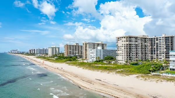 Great ocean views through floor-to-ceiling windows and an ocean front balcony. 2 bed/2.5 bath with a semi private elevator unit. This fully furnished unit is complete with a fully renovated open concept kitchen, gorgeous marble countertops and brand new top of the line appliances. Newly installed impact windows provide a peaceful environment; while city and intercostal views from the bedroom are a reminder of the accessible active nightlife, restaurants and shops just a few miles away at the nearby piers. Live like you are on vacation with resort like amenities including a BBQ, heated pool, fitness center, sauna, ping-pong tables, tennis and pickle ball courts, bocce ball, mini golf and most importantly deeded beach access.