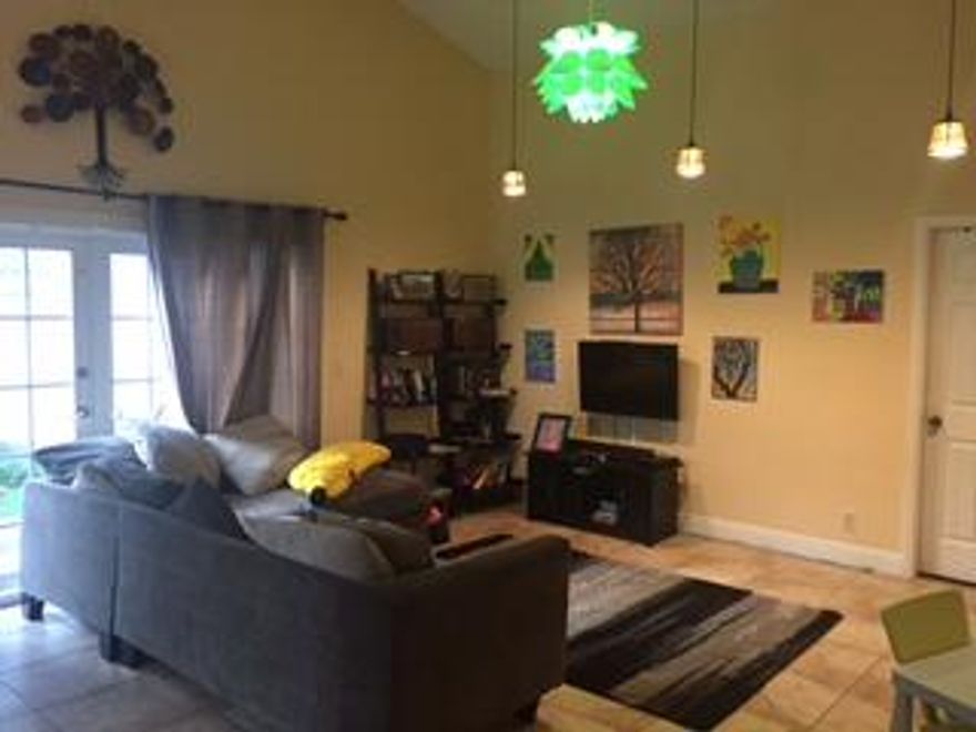 this beautiful renovated to perfection, neat as a pin, extra air-conditioned room in garage, may be used as office, or playroom or 4th bedroom, granite kitchen, tile in living areas on quiet cul de sac, across from YMCA best in county. APlus school district, greatest central boca location