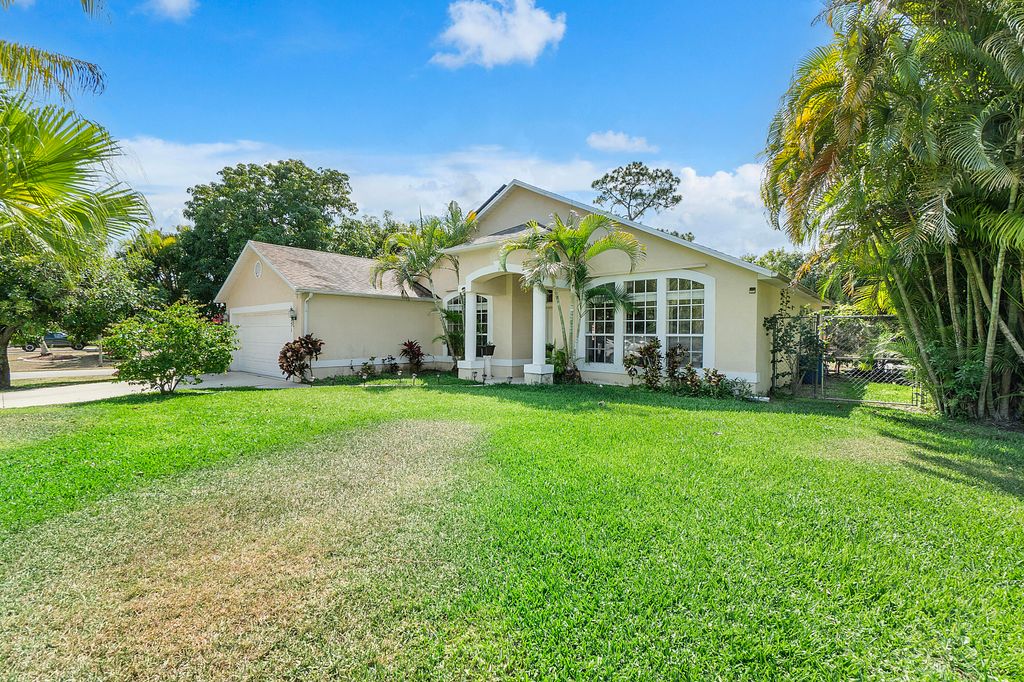 Photo of 2751 SW Pierson Road, Port Saint Lucie, FL 34953 (MLS # R10976453)