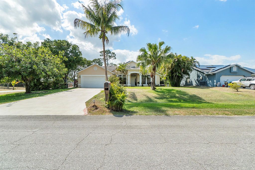 Photo of 2751 SW Pierson Road, Port Saint Lucie, FL 34953 (MLS # R10976453)