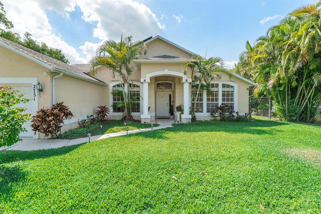 Photo of 2751 SW Pierson Road, Port Saint Lucie, FL 34953 (MLS # R10976453)