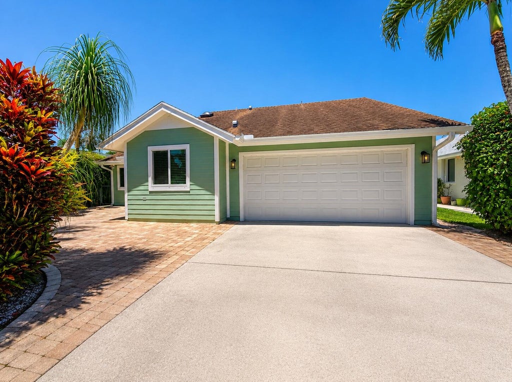 Photo of 6395 Garrett Street, Jupiter, FL 33458 (MLS # B26027927)