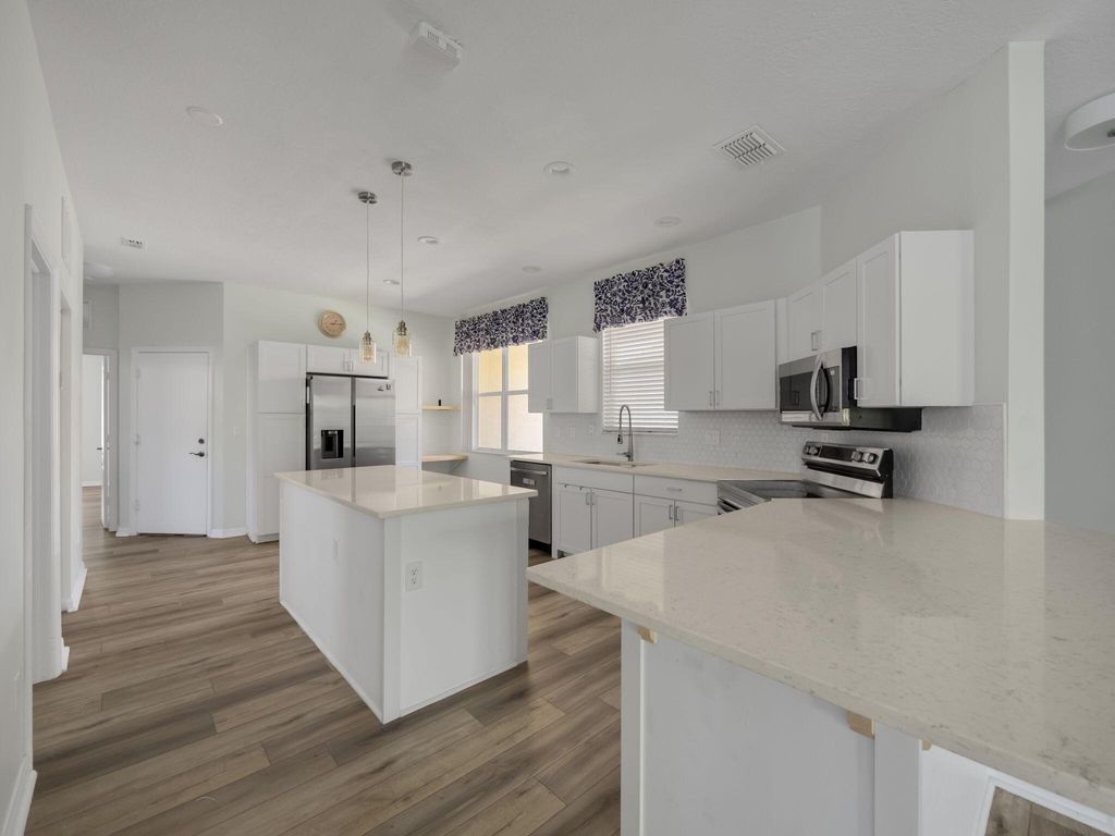 Photo of 11012 SW Dunhill Ct, Port Saint Lucie, FL 34987 (MLS # R10987479)