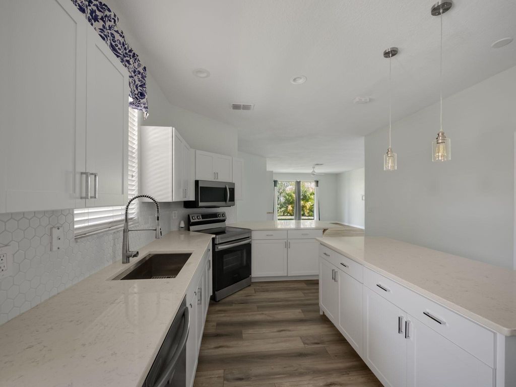 Photo of 11012 SW Dunhill Ct, Port Saint Lucie, FL 34987 (MLS # R10987479)