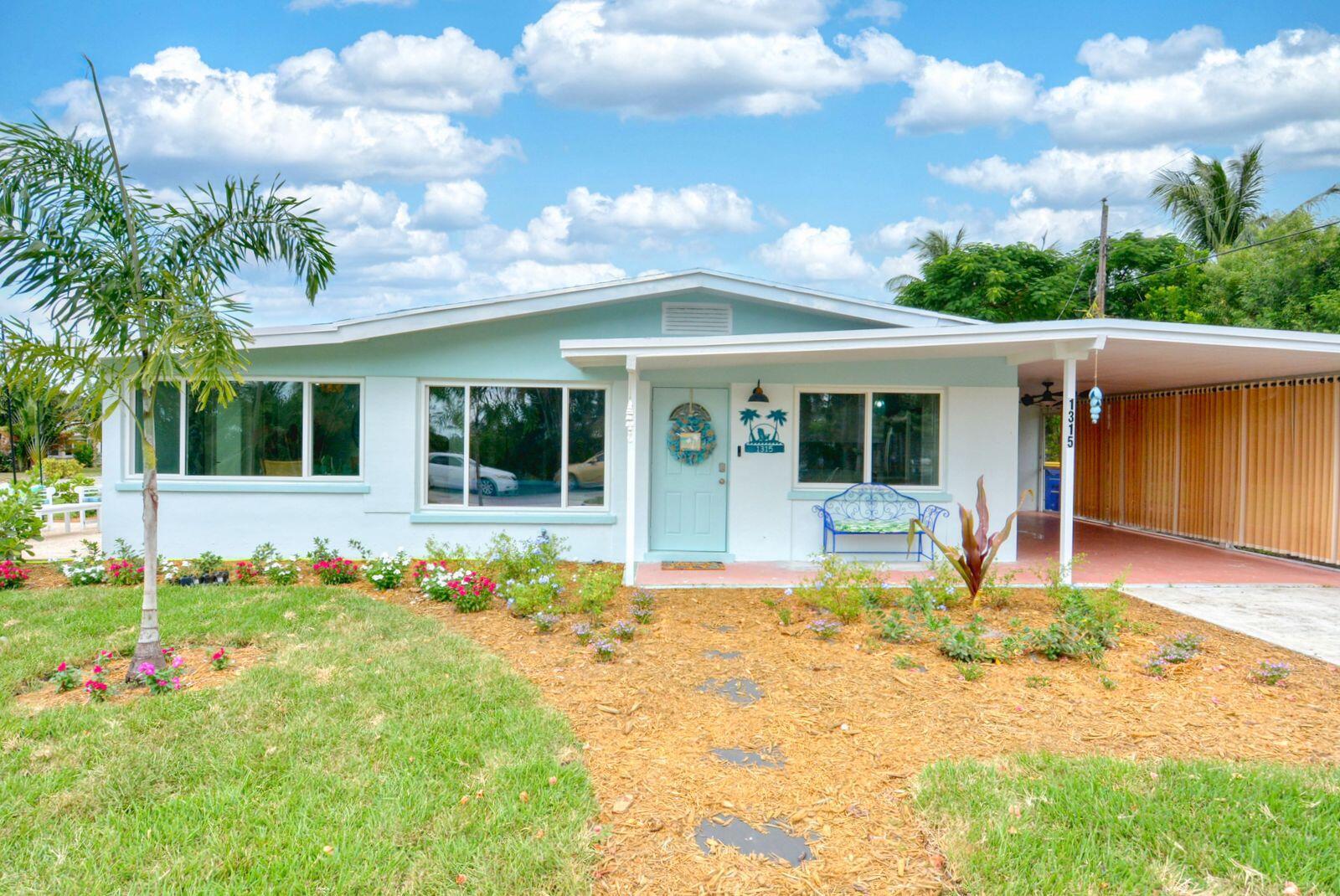 Nothing has been forgotten in this beautiful, fully furnished, Jensen Beach property. Three minutes to downtown and ten minutes to the beaches, it is tucked away in a quaint part of Jensen Beach. This 3 bedroom 2 bath home has been completely renovated. Enjoy the spectacular custom kitchen with sparkling quartz countertops and seating for 3 at the center island. The master bedroom boasts an incredible master bath with a large shower and a roomy walk in closet. The stacking washer dryer is located off the master closet. The first bedroom (The Surfboard Room) can accommodate both kids and adults and features a set of comfy bunk beds with a large closet. Check out the custom made overhead surfboard light!