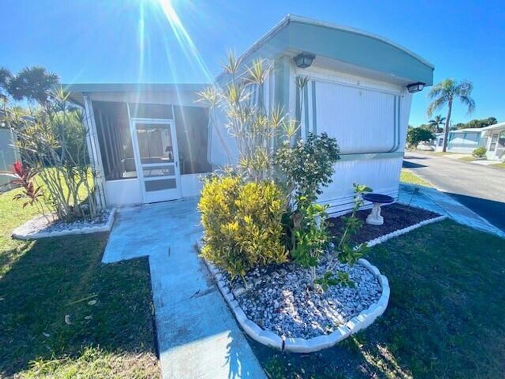 Photo of 4747 NE Blue Heron Drive, Jensen Beach, FL 34957 (MLS # R10773911)