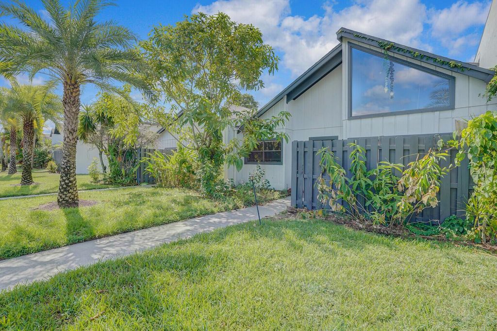 Photo of 100 Sparrow Drive #4, Royal Palm Beach, FL 33411 (MLS # R11117974)