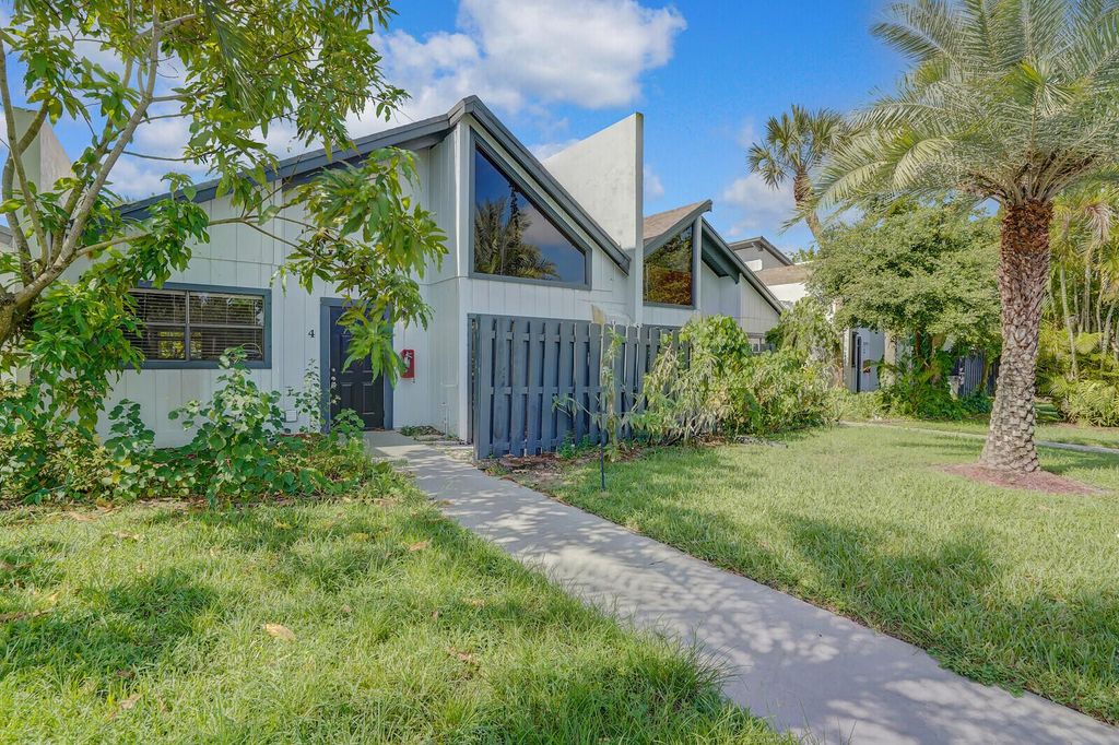 Photo of 100 Sparrow Drive #4, Royal Palm Beach, FL 33411 (MLS # R11117974)