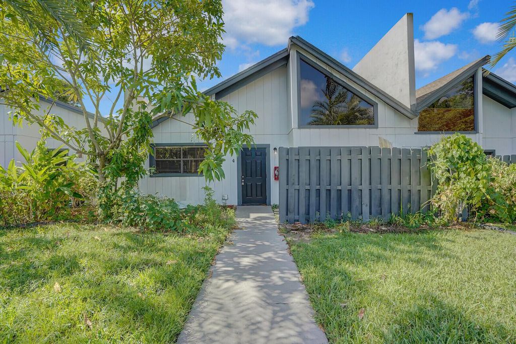 Photo of 100 Sparrow Drive #4, Royal Palm Beach, FL 33411 (MLS # R11117974)