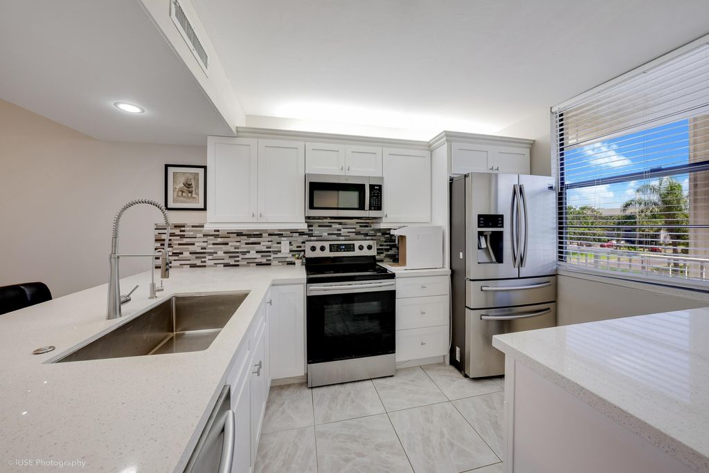 Photo of 1528 Whitehall Drive #303, Davie, FL 33324 (MLS # B26026584)