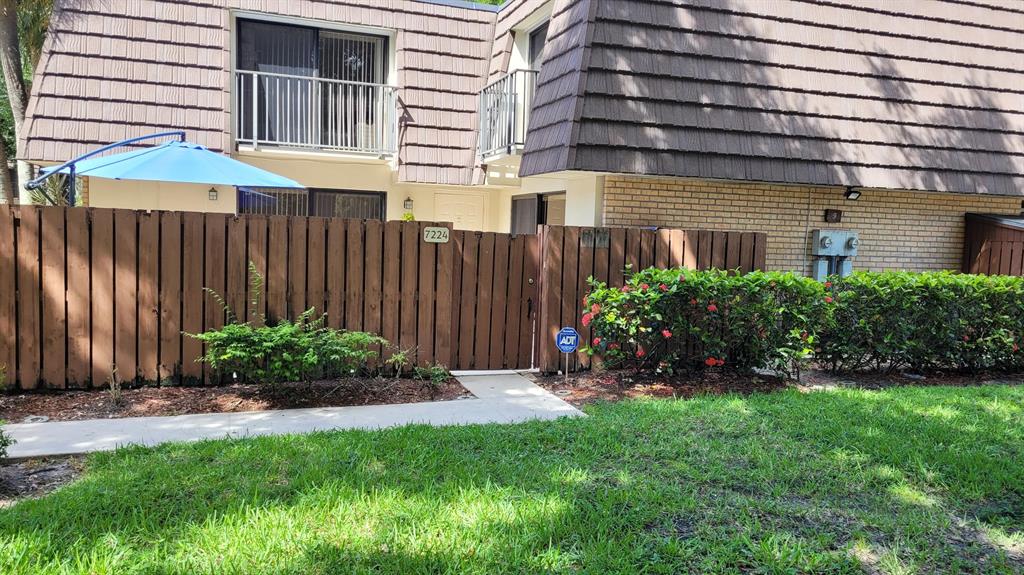 Desirable Location With Lake View! Welcome To Your New Home Before You Reach The Front Door, Of This Spacious 2-Bedroom 2.5-Bathroom Townhouse You Will Enter Through a Large, Fenced Patio Great For Entertaining. This Home Has An Open Space Concept Flowing From The Living Room Into The Kitchen Which Includes Stainless Steel Appliances And Granite Countertops. Laminate Flooring On The First Floor And Carpet On The Stairs And Continued Into The Bedrooms. Half Bathroom With Laundry Downstairs. Two Large Bedrooms Upstairs With Their Own Full Bathroom. Location Is Great Walking Distance To Playground, Picnic Area, Walking Trail And Swimming Pools. The Community Has Great Amenities And Is In The Process Of Replacing All The Wooden Fence With New PVC Fencing. Close To Beaches, Ballpark & Airport