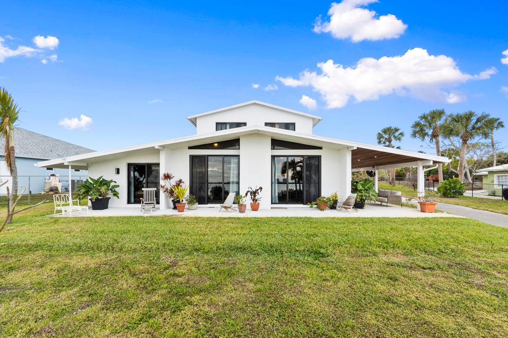 Photo of 8309 S Indian River Drive, Fort Pierce, FL 34982 (MLS # B26013093)