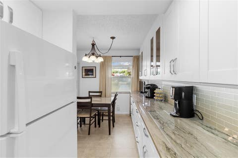 Tiny photo for 210 Oakridge N #210, Deerfield Beach, FL 33442 (MLS # B26037141)