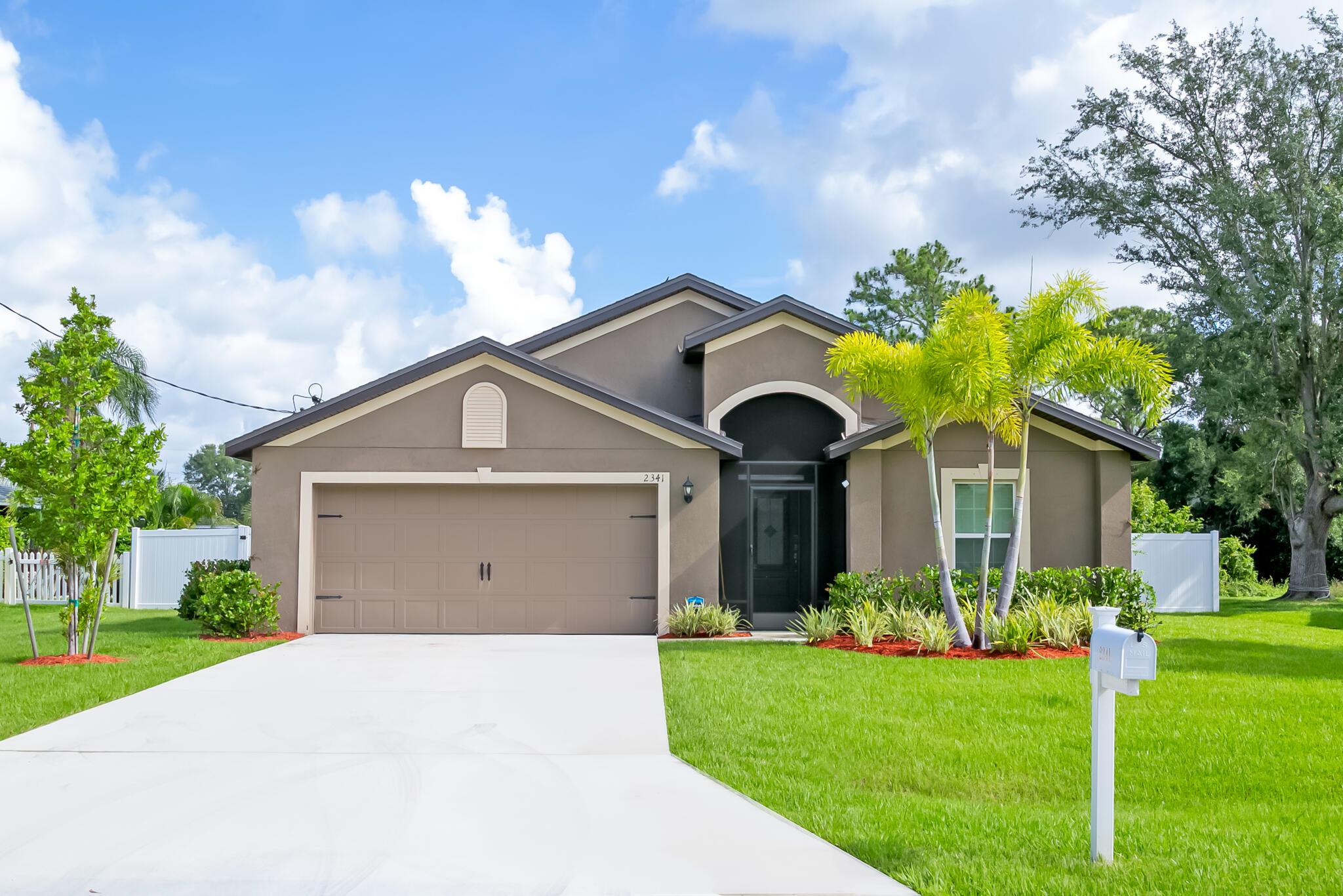 Located east of US-1, this 2023 built 4-bedroom + flex room home offers modern living in a prime location just minutes from beaches, shopping & restaurants. Step inside & enjoy a bright, open floor plan designed to suit any lifestyle. The spacious kitchen features white cabinetry, Whirlpool stainless steel appliances, granite countertops, large pantry, breakfast bar & separate laundry room for added convenience.The private primary suite is tucked away for ultimate relaxation, complete with a spa-like bath including dual sinks, a soaking tub, separate shower & a generously sized walk-in closet.This home is a true 4 bedrooms + flex room (ideal for a home office or den).Large, fenced-in backyard with screened patio under truss. Also included Security camera system & sprinkler system.