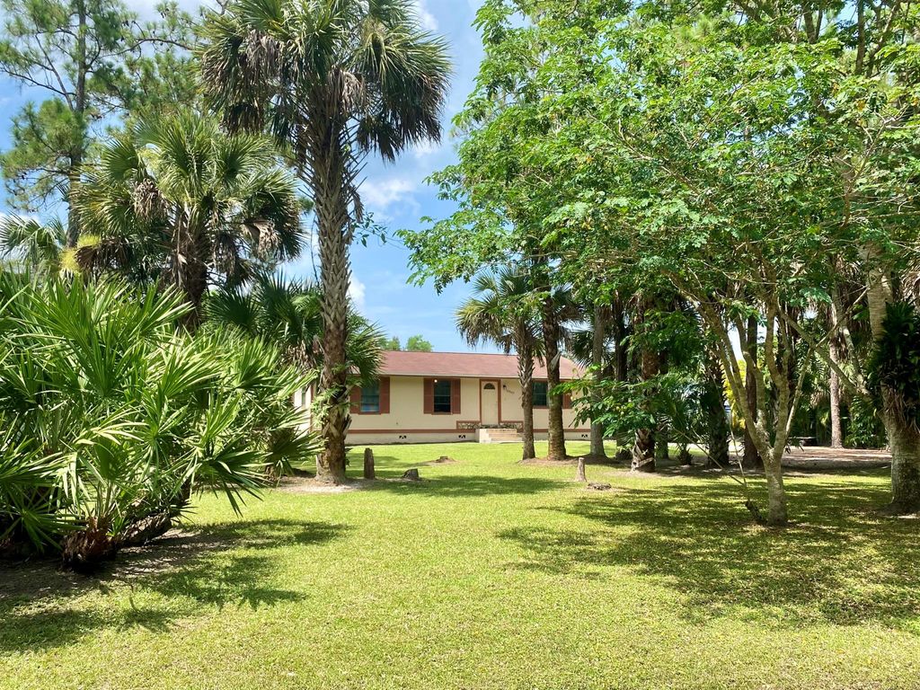Photo of 10547 150 Court N, Jupiter, FL 33478 (MLS # R10903388)