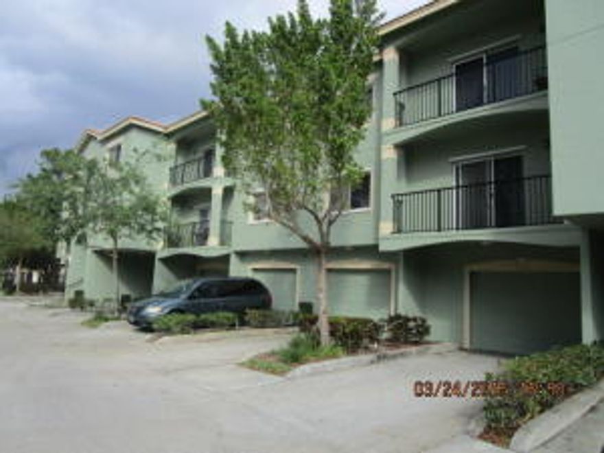 2 bedroom 2 bathroom  condo with 1 car garage, 2nd floor unit, gated community, open floor plan.