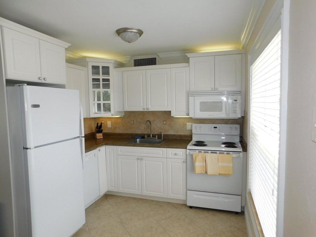 Photo of 735 Hummingbird Way #204, North Palm Beach, FL 33408 (MLS # B26022587)
