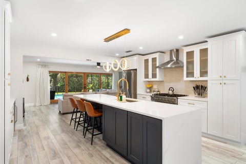 Photo of 8416 Pine Tree Lane, Lake Clarke Shores, FL 33406 (MLS # B26055432)