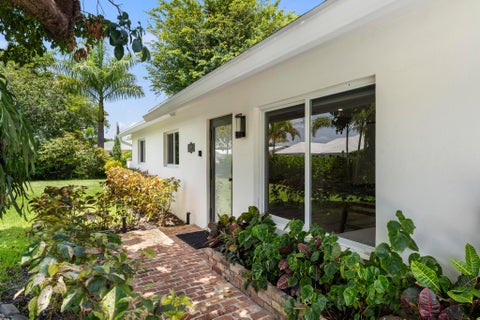 Photo of 8416 Pine Tree Lane, Lake Clarke Shores, FL 33406 (MLS # B26055432)