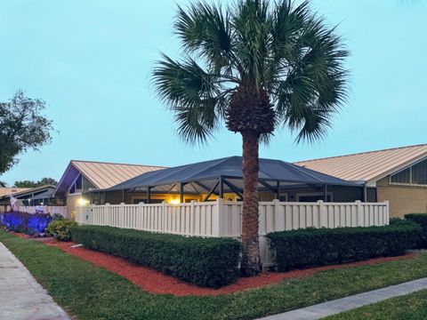 Photo of 5513 Eagle Lake Drive, Palm Beach Gardens, FL 33418 (MLS # B26013034)